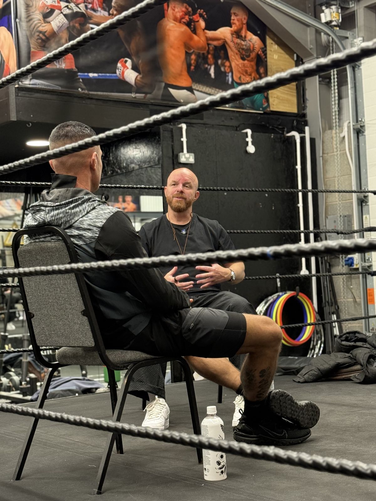 In conversation, in the ring.